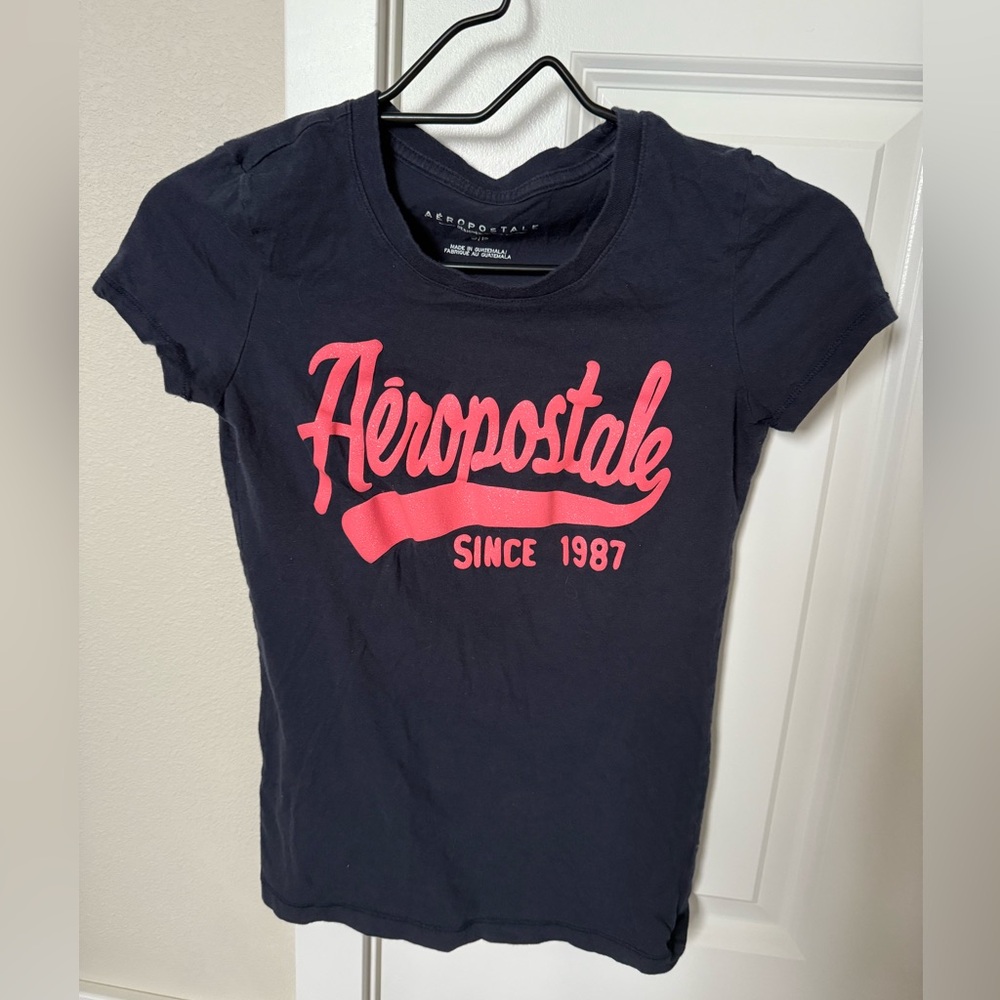 Women’s size small Aeropostale tee. Navy and pink with sparkly lettering.